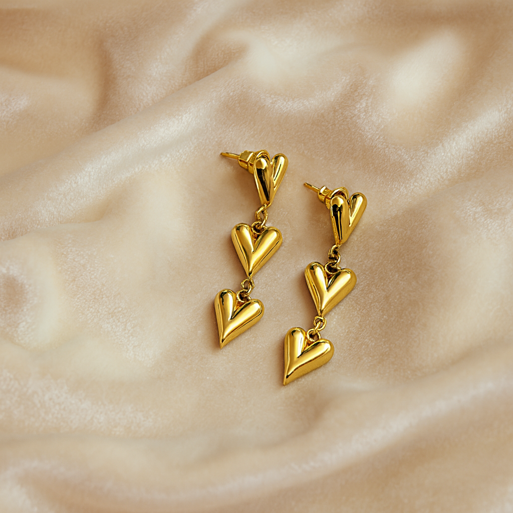 Elegant Triple Heart Golden Dangler Earrings